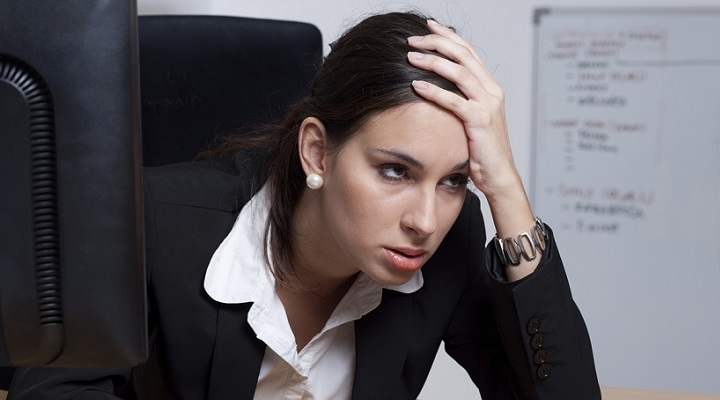 Tired businesswoman fed up with her job